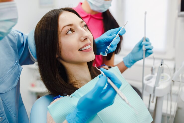 young-woman-having-dental-treatment-clinic_1153-654 Young woman having a dental treatment at clinic<br />